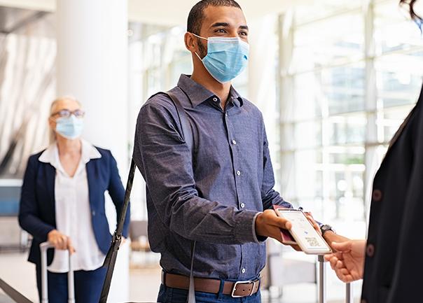 person wearing a mask in an airport