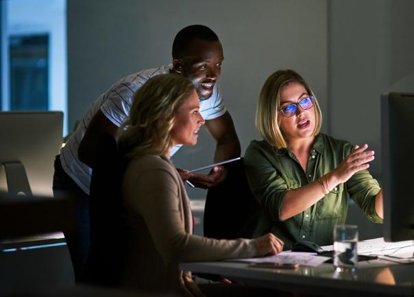 People around a computer.