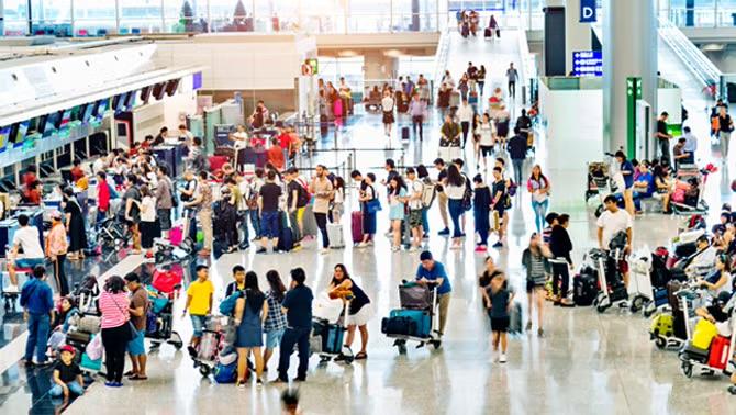 A busy airport as FCM Travel and Corporate Traveller revealed global and domestic air capacity have reached pre-pandemic levels for the first time